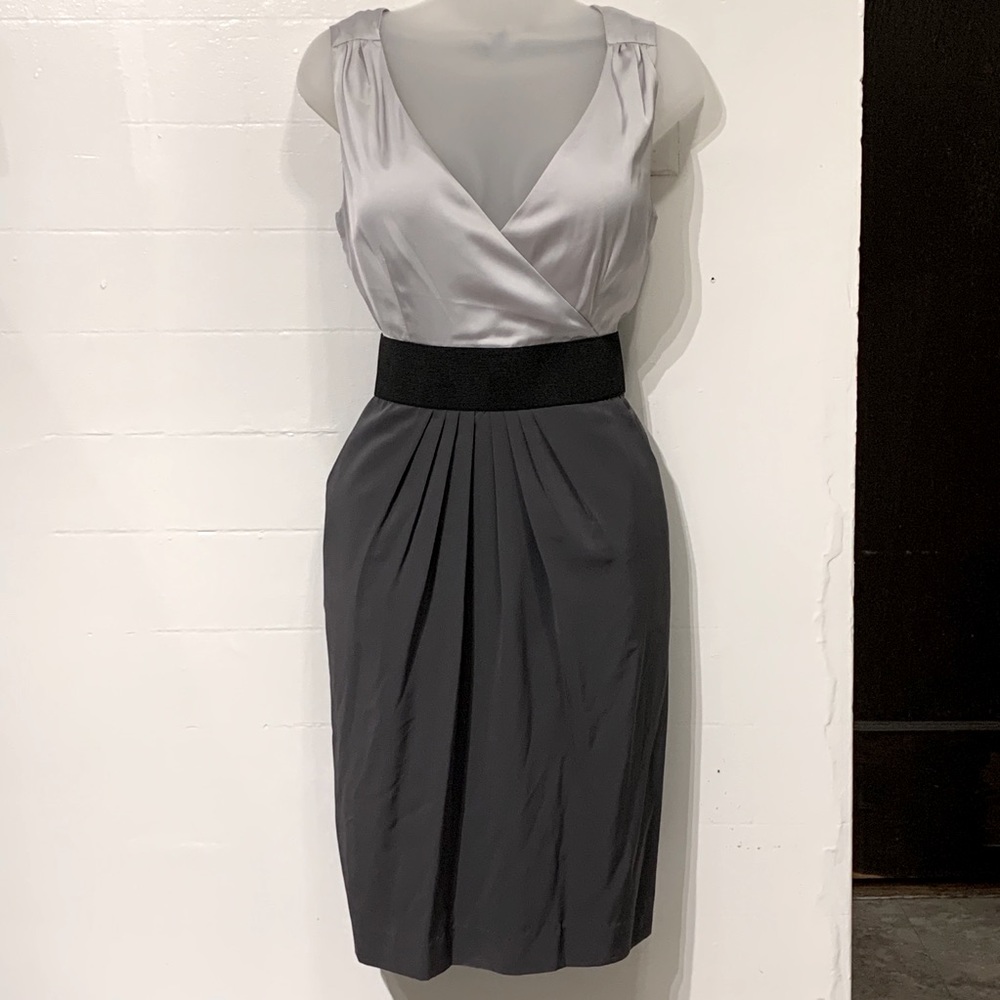 H&M. V-neck dress with pockets.